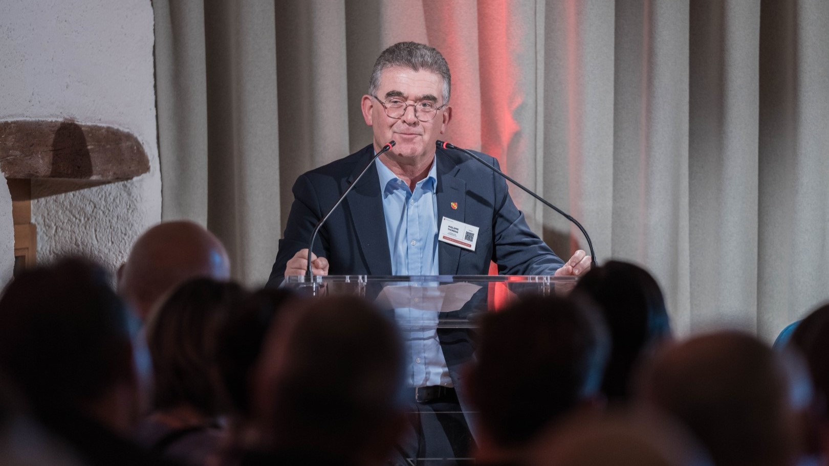 Triangle behind a mountain range made with structural grid like texture